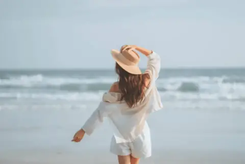 How to Style the Perfect Beach Day Outfit This Summer Season