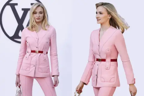 Sophie Turner Rocks in Pink Pantsuit at Louis Vuitton’s Show